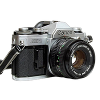 Used Canon AE-1 w/ 50mm 1.8 Chrome - Excellent 4