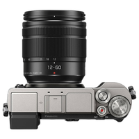 USED EXCELLENT CONDITION GX9 SILVER W/12-60MM 2