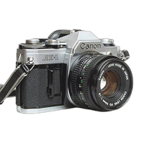 Used Canon AE-1 Program w/ 50mm 1.8 - Good 4