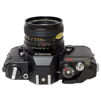 Used Konica Autoreflex T4 w/ 50mm f/1.7 - Good 1