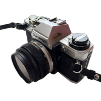 Used Olympus OM10 w/ 50mm 1.8  and  FC Manual Adapter - Good 1